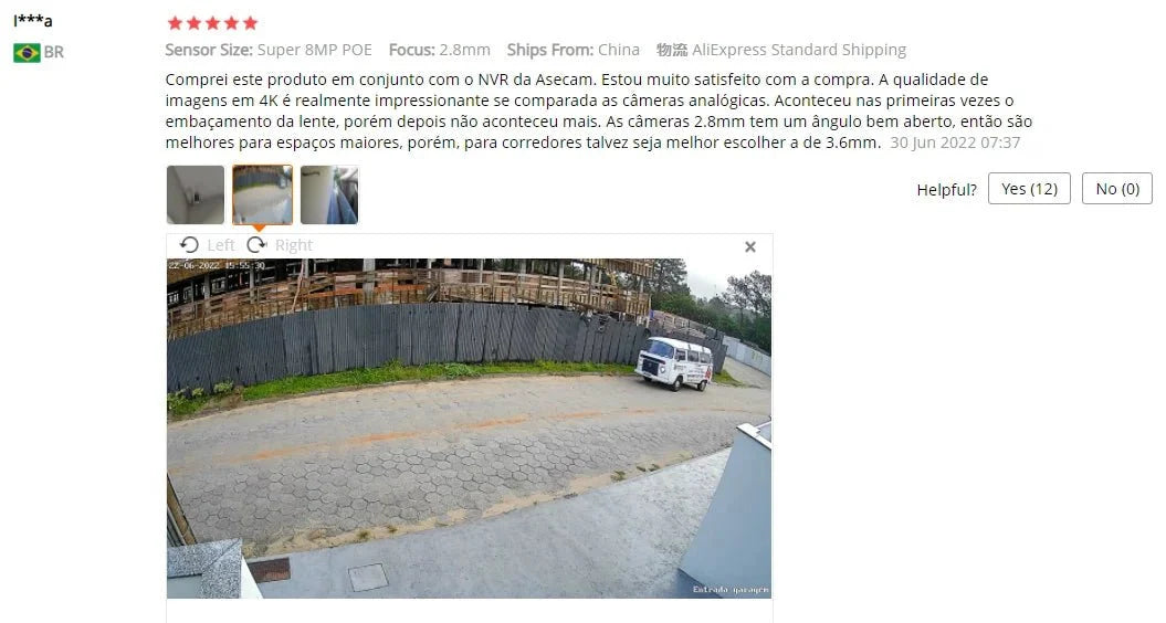 4K 8MP outdoor security camera feed capturing a street with a white van beside a construction fence.